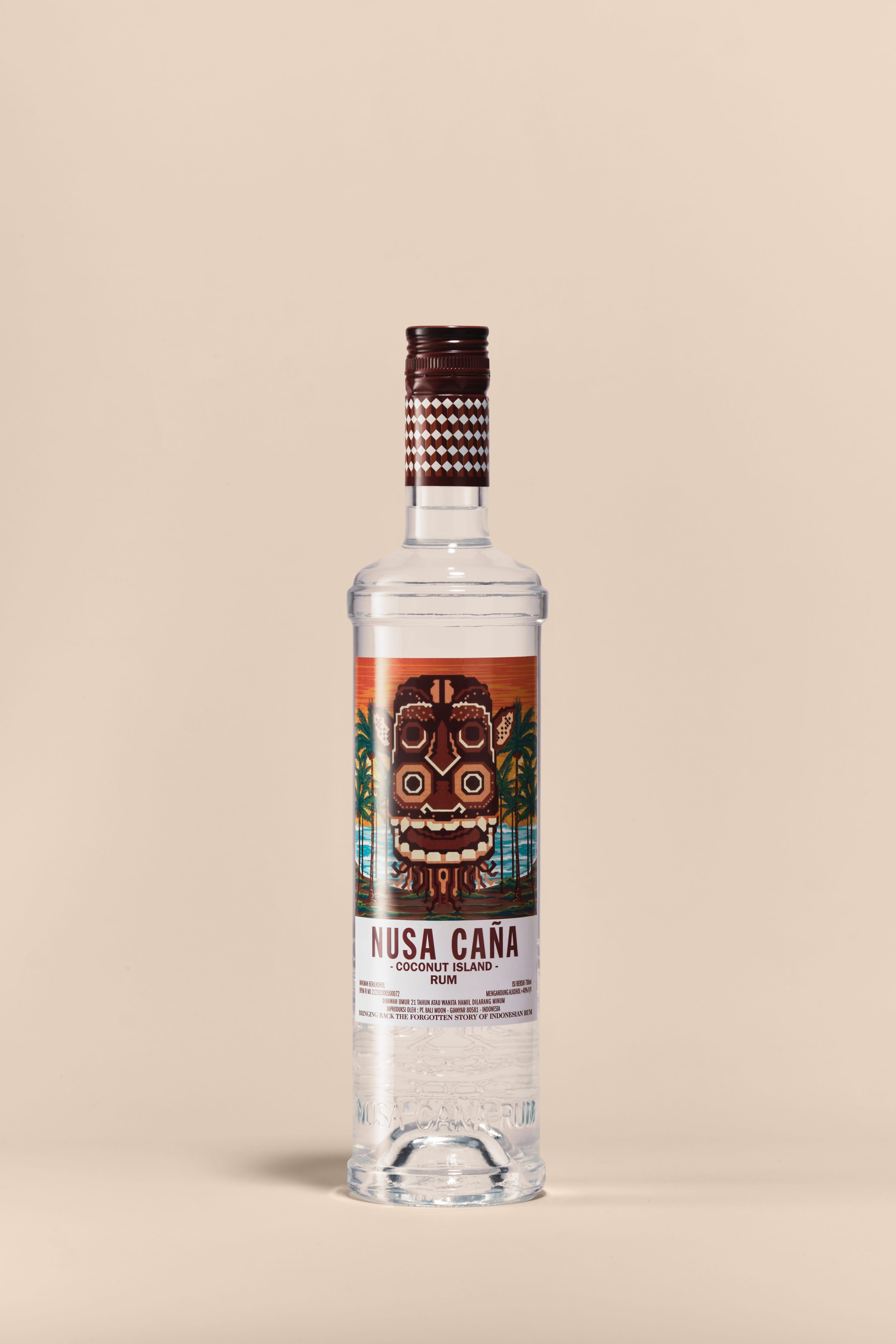 Nusa Caña Coconut Island rum bottle with a beige background.